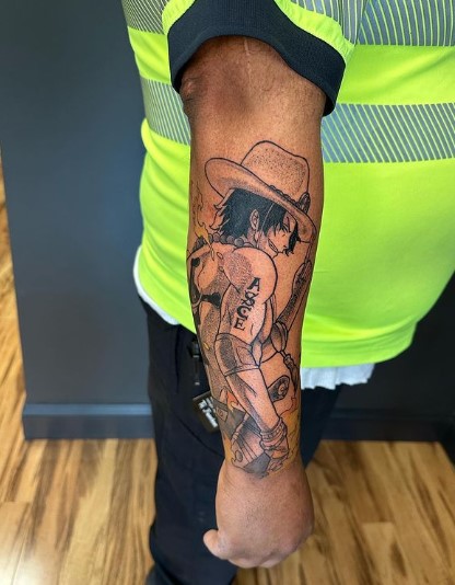ace arm tattoo